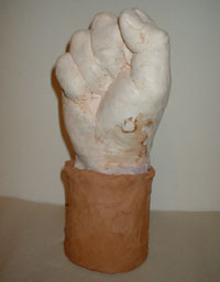 Paul Sixsmith sculpture - fist in a plant pot